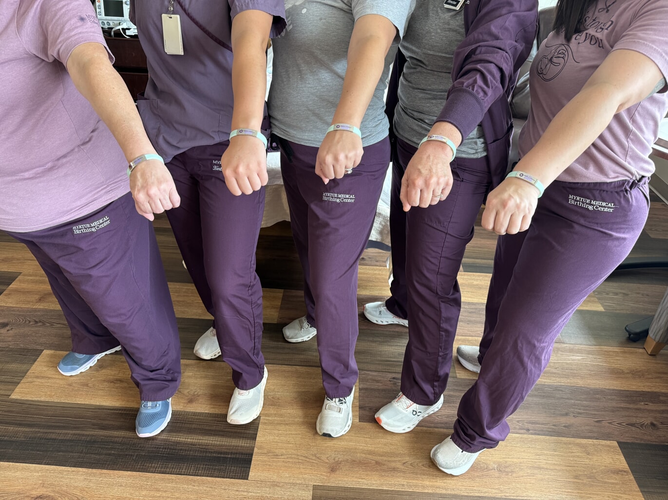 nurses wearing their teal medical alert bracelets